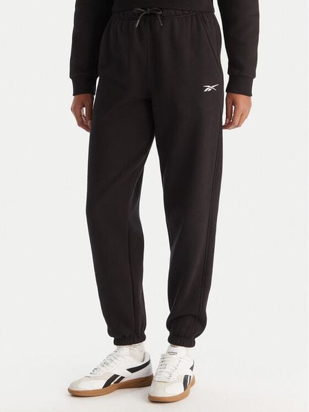 Reebok Spodnie dresowe Reebok X Ewa Chodakowska Evren RK25308CCW Czarny Regular Fit. Czarne spodnie dresowe damskie Reebok, l, bez wzorów, z bawełny. Za 179.99 zł.
