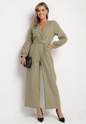 Zielony Bawełniany Kombinezon o Kopertowym Kroju z Paskiem i Gumką w Talii Mirrira. Zielone sukienki damskie Born2be, l, bez wzorów, z bawełny, eleganckie, bez kołnierzyka, bez ramiączek, kopertowe. Za 79.99 zł.