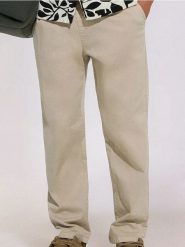 Spodnie chino jogger - beżowy. Brązowe spodnie materiałowe męskie Sinsay, bez wzorów. W wyprzedaży za 55.99 zł.