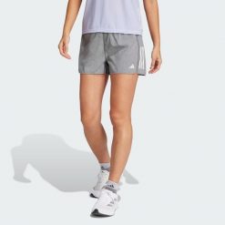 Szorty Own the Run. Białe szorty sportowe damskie Adidas, bez wzorów, sportowe, do biegania. Za 161.75 zł.