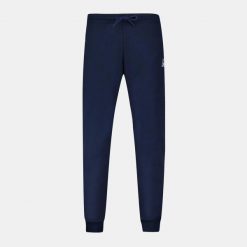 Wąskie spodnie do biegania Le Coq Sportif N°2. Niebieskie spodnie sportowe męskie le coq sportif, uniwersalny, bez wzorów, z dresówki, do biegania. Za 318.35 zł.