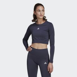 Koszulka damska adidas Aeroknit Seamless Fitted Cropped. Białe koszulki sportowe damskie Adidas, s, bez wzorów, z materiału, sportowe, bez kołnierzyka. Za 102.00 zł.