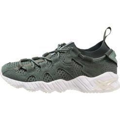 Asics Tiger GEL MAI Tenisówki i Trampki dark forest. Trampki i tenisówki damskie marki Asics Tiger. W wyprzedaży za 455.40 zł.