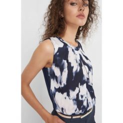 Koszula bimaterial ze wzorem. Niebieskie koszule damskie Orsay, z dzianiny, z dekoltem na plecach. Za 69.99 zł.