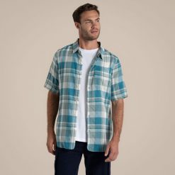 Koszula Craghoppers Argino. Niebieskie koszule męskie Craghoppers, m, bez wzorów, casualowe, bez kołnierzyka, bez ramiączek. Za 303.75 zł.