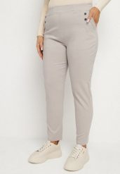 Beżowe Spodnie z Wiskozą i Ozdobnymi Guzikami Tenzina. Brązowe spodnie sportowe damskie Born2be, plus size, bez wzorów, z jeansu. Za 54.99 zł.