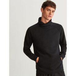 Bluza kangurka z kołnierzem - Czarny. Bluzy męskie marki KALENJI. W wyprzedaży za 59.99 zł.