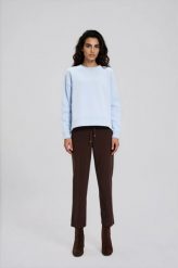 Gładka bluza błękitna. Niebieskie bluzy damskie MOODO, l, bez wzorów, z bawełny, bez kaptura. Za 89.99 zł.