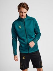 Bluza dresowa zapinana na zamek błyskawiczny Hummel Cima XK. Niebieskie bluzy męskie Hummel, s, bez wzorów, z dresówki, bez kaptura, do piłki ręcznej. Za 233.30 zł.