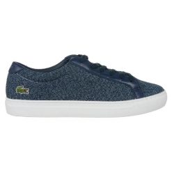 Buty lifestylowe Lacoste L 12 12 317 W 7-34CAW0017003 białe niebieskie. Białe trampki i tenisówki damskie bez wzorów, z materiału, bez zapięcia. Za 544.84 zł.