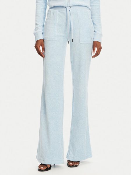 Juicy Couture Spodnie dresowe Layla JCSEBJ001 Błękitny Flared Leg. Niebieskie spodnie dresowe damskie Juicy Couture, xl, bez wzorów, z dresówki. Za 219.99 zł.