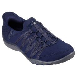 Damskie BREATHE-EASY ROLL-WITH-ME Slip-On Granatowy. Niebieskie trampki i tenisówki damskie Skechers, bez wzorów, z dzianiny, casualowe, bez zapięcia. Za 379.99 zł.