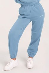 Spodnie fitness damskie Gym Glamour dresowe. Niebieskie spodnie dresowe damskie GYM GLAMOUR, s, bez wzorów, z bawełny. Za 189.99 zł.