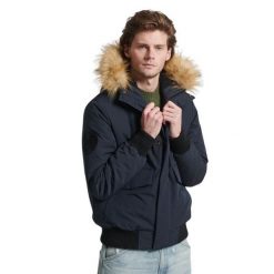 Kurtka z kapturem Superdry Everest. Niebieskie kurtki męskie Superdry., m, bez wzorów, z puchu, z kapturem. W wyprzedaży za 705.55 zł.