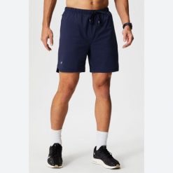 Szorty Fabletics The One 7". Niebieskie szorty męskie FABLETICS, s, bez wzorów, z materiału, biznesowe. Za 276.25 zł.
