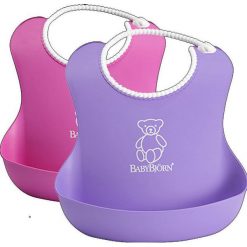2 śliniaki - różowy / fioletowy. Czerwone śliniaki dla dzieci BABYBJORN. Za 64.99 zł.