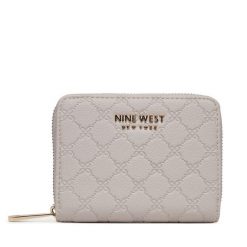 Portfel Nine West. Fioletowe portfele damskie Nine West, bez wzorów. Za 69.99 zł.