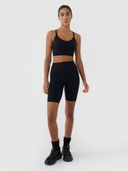4F Legginsy kolarki bezszwowe treningowe damskie - czarne XS/S. Czarne legginsy damskie 4f, l, bez wzorów, z dzianiny. W wyprzedaży za 89.99 zł.