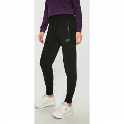 New Balance - Spodnie. Szare spodnie materiałowe damskie New Balance, z bawełny. Za 249.90 zł.