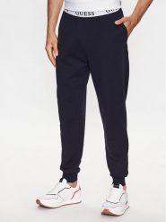 Guess Spodnie piżamowe U3YB00 KBS91 Granatowy Regular Fit. Niebieskie piżamy męskie Guess, l, z aplikacjami, z bawełny, bez ramiączek. Za 259.99 zł.