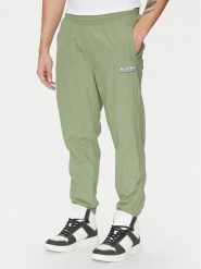 Karl Kani Joggery Essentia 60060039 Zielony Regular Fit. Zielone spodnie materiałowe męskie Karl Kani, m, bez wzorów, z syntetyku. Za 149.99 zł.