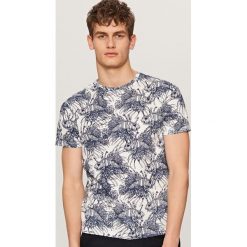 T-shirt z nadrukiem - Kremowy. Białe t-shirty i topy dla dziewczynek Reserved, z nadrukiem. Za 39.99 zł.