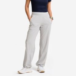 Spodnie fitness damskie Domyos oversize. Szare obuwie sportowe damskie DOMYOS, bez wzorów, z elastanu, na fitness i siłownię. Za 129.99 zł.