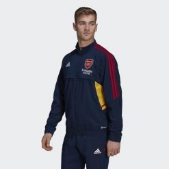 Kurtka do piłki nożnej męska Adidas Arsenal Presentation Condivo 2022/23. Niebieskie kurtki męskie Adidas, m, bez wzorów, z dresówki, bez kaptura. Za 319.60 zł.