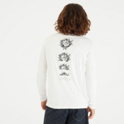 Koszulka UV surfingowa męska Olaian Flower UPF50+ długi rękaw. Białe koszulki sportowe męskie OLAIAN, m, bez wzorów, z dzianiny, bez kołnierzyka, bez ramiączek, na fitness i siłownię. Za 59.99 zł.
