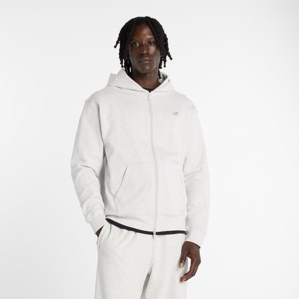 Bluza męska New Balance MJ53506AHH – szara. Szare bluzy męskie New Balance, m, bez wzorów, z materiału, z kapturem. Za 389.99 zł.