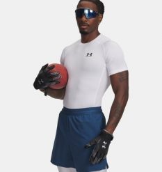 Koszulka termoaktywna męska biała Under Armour Heat Gear. Białe koszulki sportowe męskie Under Armour, l, bez wzorów, bez kołnierzyka, bez ramiączek, na fitness i siłownię. Za 139.99 zł.