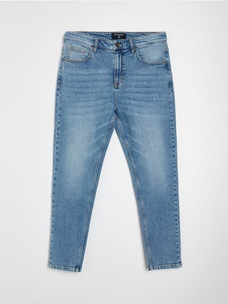 Jeansy carrot fit z efektem sprania - niebieski. Niebieskie jeansy męskie Sinsay. Za 79.99 zł.