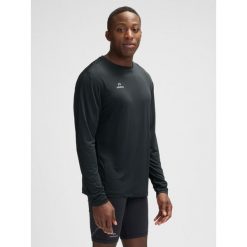 Dżersej z długim rękawem Newline Beat. Czarne koszulki sportowe męskie Newline, bez wzorów, z dżerseju, bez kołnierzyka, bez ramiączek, do piłki nożnej. Za 177.50 zł.
