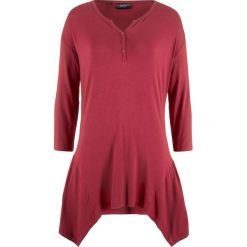 Shirt z dłuższymi bokami i kołnierzykiem "henley" bonprix pomarańczowo-czerwony. Bluzki damskie bonprix. Za 37.99 zł.