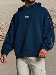 Bluza żakardowa z kontrastową lamówką - granatowy. Niebieskie bluzy męskie Sinsay, l, bez wzorów, z żakardem, bez kaptura. Za 69.99 zł.