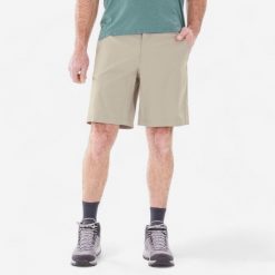 Spodenki turystyczne męskie Quechua MH100. Brązowe krótkie spodenki sportowe męskie QUECHUA, l, bez wzorów, z materiału, trekkingowe. Za 59.99 zł.