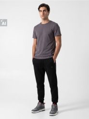 Spodnie dresowe comfort fit z domieszką bawełny - czarny. Czarne spodnie sportowe męskie Sinsay, l, bez wzorów, z bawełny, na fitness i siłownię. Za 39.99 zł.