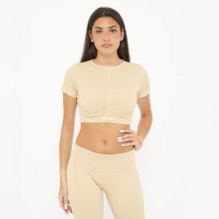 Crop top treningowy damski WAY krótki rękaw. Brązowe obuwie sportowe damskie Legea, bez wzorów, sportowe, bez kołnierzyka. W wyprzedaży za 68.00 zł.
