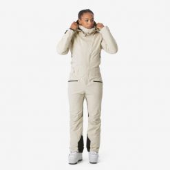 Kombinezon narciarski i snowboardowy damski Quechua Suit 500. Białe spodnie snowboardowe damskie WED'ZE, na zimę, l, bez wzorów, z materiału, narciarskie. Za 649.99 zł.