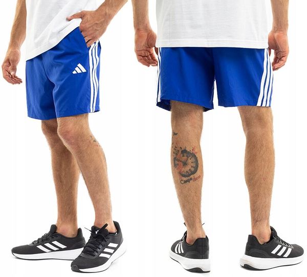Spodenki męskie adidas Essentials 3-Stripes Chelsea. Niebieskie szorty męskie Adidas, m, bez wzorów, z materiału, klasyczne. Za 98.99 zł.