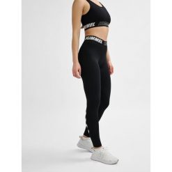 Damskie bawełniane legginsy o średnim kroju Hummel TE Maja. Czarne legginsy damskie Hummel, xs, bez wzorów, z bawełny. Za 121.50 zł.