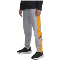 Spodnie do biegania męskie Under Armour Velociti Storm. Szare buty sportowe męskie Under Armour, m, bez wzorów, z dresówki, do biegania. Za 189.99 zł.