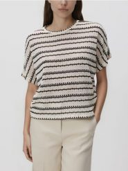 Wzorzysta bluzka - wielobarwny. Bluzki damskie Reserved, l, bez wzorów, z dzianiny, bez kołnierzyka, bez ramiączek. Za 79.99 zł.