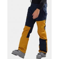 Spodnie Narciarskie Męskie Fundango Teak Colourblock. Niebieskie spodnie snowboardowe męskie Fundango, m, bez wzorów, narciarskie. W wyprzedaży za 499.00 zł.