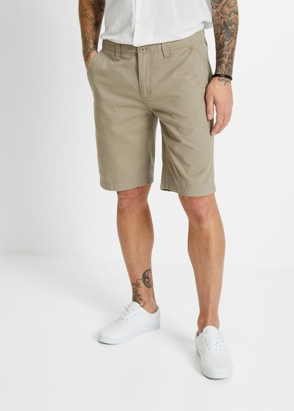 Bermudy chinosy, z czystej bawełny, regular fit. Zielone eleganckie spodnie męskie bonprix, m, bez wzorów, z bawełny. Za 92.99 zł.