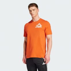 Koszulka Football Kicks Graphic. Czerwone koszulki sportowe męskie Adidas, l, bez wzorów, bez kołnierzyka, bez ramiączek, do piłki nożnej. Za 99.99 zł.