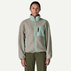 PATAGONIA Bluza damska W's Synch Jkt oatmeal heather w/thin ice-L. Niebieskie bluzy damskie Patagonia, l, bez wzorów, z materiału, bez kaptura. Za 617.65 zł.