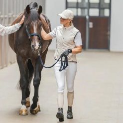 Damskie spodnie jeździeckie o średniej przyczepności Kingsland Kerry. Białe spodnie materiałowe damskie KINGSLAND, bez wzorów. Za 655.50 zł.