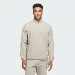Bluza ULTIMATE365 SET WOVEN QUARTER-ZIP. Brązowe bluzy męskie Adidas, s, bez wzorów, z tkaniny, bez kaptura. Za 399.00 zł.