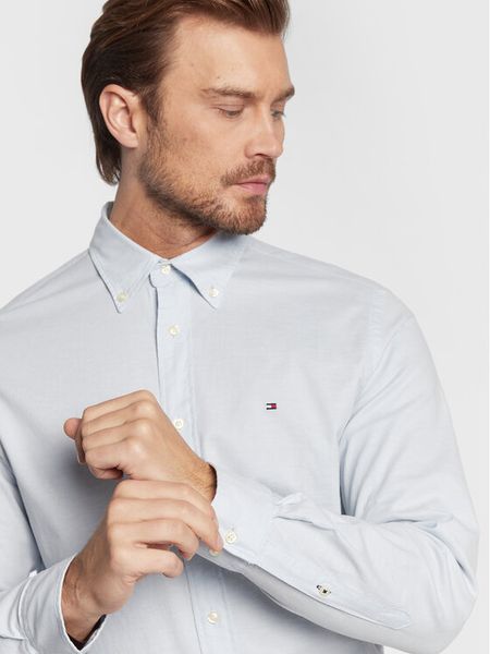 Tommy Hilfiger Koszula Oxford MW0MW25037 Błękitny Regular Fit. Niebieskie koszule męskie Tommy Hilfiger, m, bez wzorów, z bawełny, bez kołnierzyka, bez ramiączek. Za 239.99 zł.